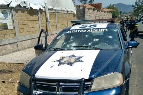 EdoMex: Matan a 13 policias en una emboscada.