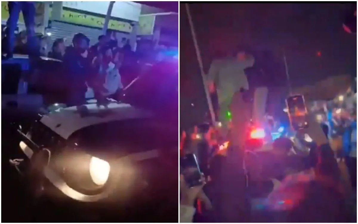 Jóvenes que arman arrancones brincan sobre patrulla con policías en su interior en Puebla (Video)